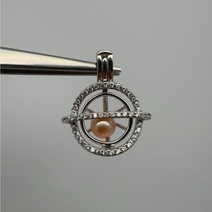 Elegant Silver and Pearl Cage Pendant